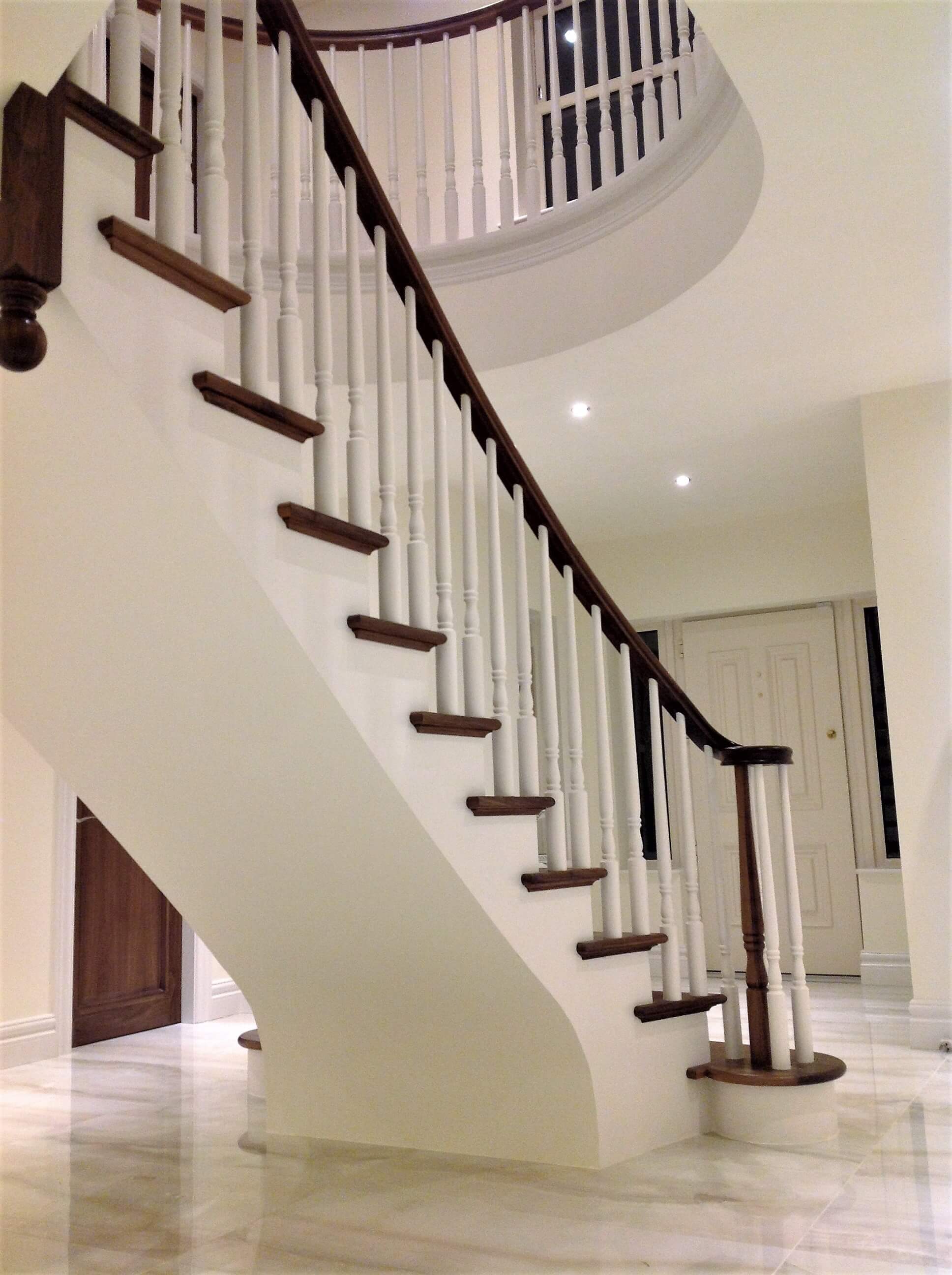 Flared concrete stairs and curved landing Curved Stairs Ireland